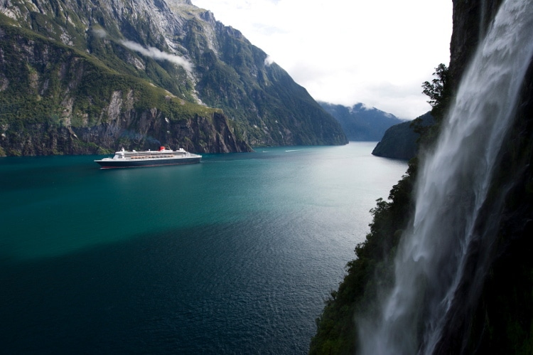 Milford Sound waterfall and QM2